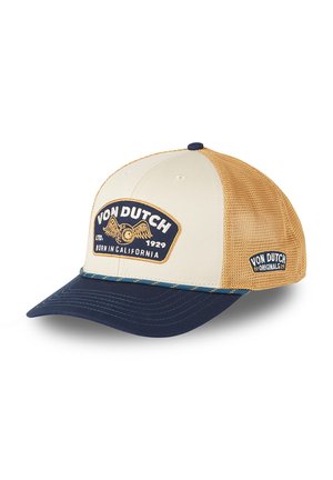 Baseball cap with navy brim, cream front panel, tan mesh back, featuring "Von Dutch 1929 Born in California" embroidered patch.