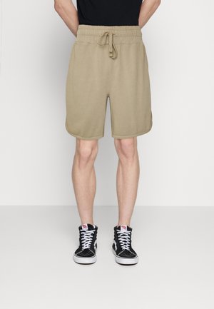 Pantalones deportivos - beige