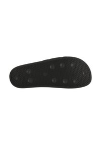 Zwarte rubberen schoenzool met een gestructureerd oppervlak, voorzien van een patroon van verhoogde driehoeken en ronde punten voor grip. Vlak en licht taps toelopend van vorm.