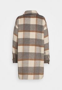 Skjortjacka i ullblandning med rutmönster i beige, brunt och grått, med krage och uppvikta ärmar. Slät textur.