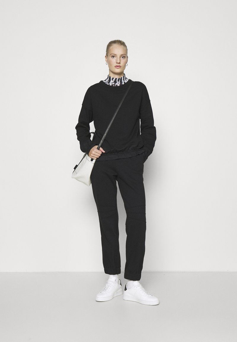 Damen Bekleidung | Dear Freedom TRACK PANTS Jogginghose black/schwarz - HY52992 Damen Bekleidung | Dear Freedom TRACK PANTS Jogginghose black/schwarz - HY52992