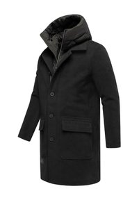 Fekete gyapjú kabát pufi fekete bélés béléssel, kapucnival, gombos záródással, két elülső zsebbel, és elegáns, szabott sziluettel.