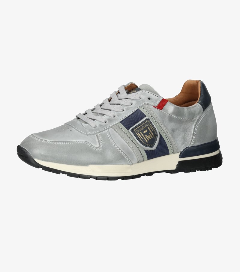 Light gray sneaker made of smooth leather, featuring a navy stripe, logo detail, and red accent, with rounded toe and black sole.