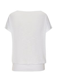 White short-sleeved top with a loose fit, round neckline, and ribbed hem. The fabric has a subtle texture and soft drape.