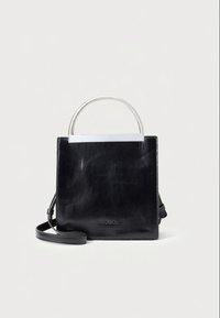 Black leather handbag with a glossy finish, rectangular shape, silver metal handle, and detachable shoulder strap. Features embossed logo detail.