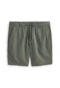 Pantaloni corti verde oliva realizzati in tessuto leggero, con parte frontale piana, vita elastica e cordoncino. Presentano due tasche laterali e cuciture che seguono le linee.