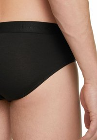 FALKE DAILY CLIMATE CONTROL OUTLAST® - Slip - black