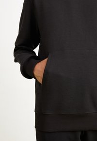 The North Face Huppari - black