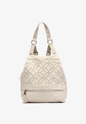 Sac à main couleur crème avec deux anses, présentant un motif circulaire matelassé et une poche avant zippée.
