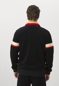 Sergio Tacchini SLICE TRACK JACKET - Veste de survêtement - black