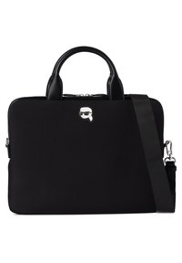 Black laptop bag made of smooth fabric, featuring two top handles, a detachable strap, and a silver cartoon logo on the front.