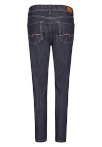 Dark blue denim jeans with a fitted shape, featuring a woven texture, orange stitching, two back pockets, and a brown leather patch at the waistband.