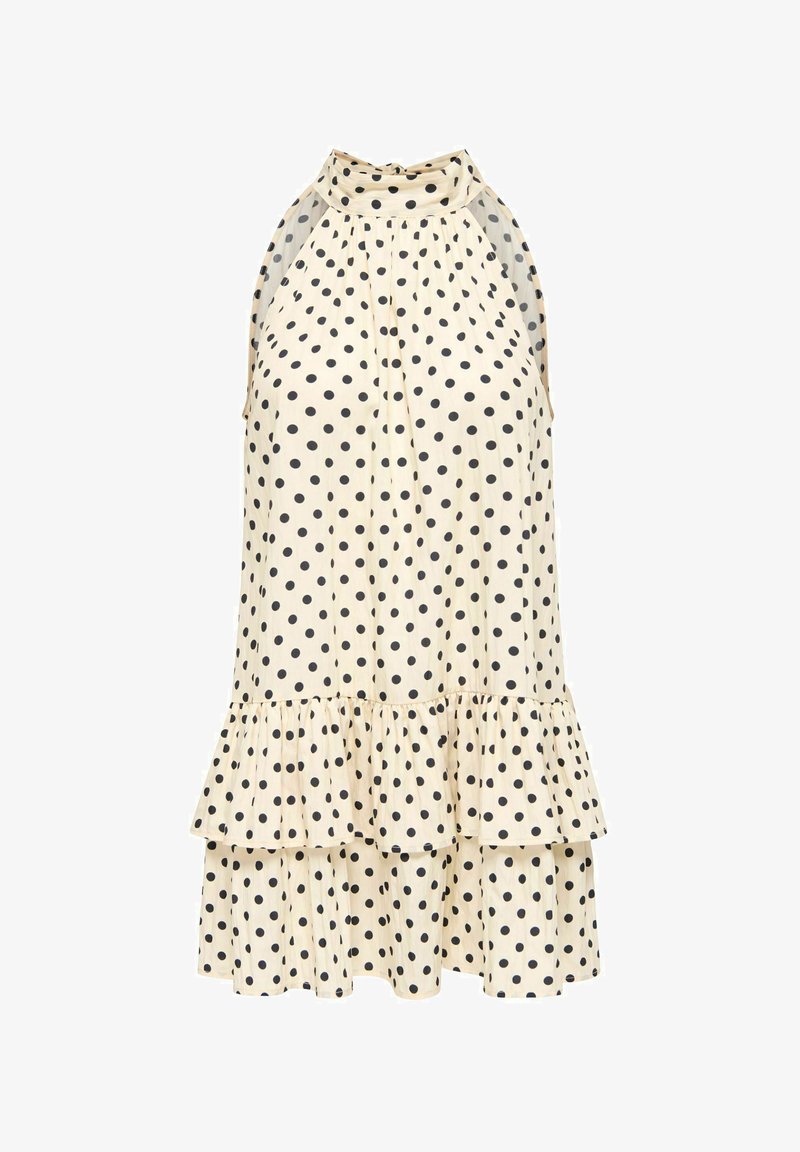Robe crème sans manches à pois noirs, col haut à volants et ourlet volanté à double couche.