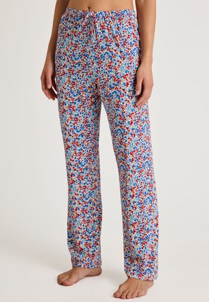 Bloemmotief pyjamabroek in het wit, met een patroon van rode en blauwe bloemen, elastische tailleband en een losse, rechte pasvorm.