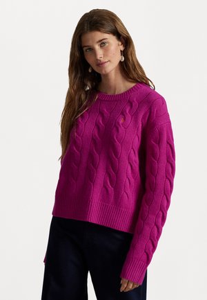 Leuchtend rosa Kabelstrickpullover mit Rundhalsausschnitt, geripptem Saum und langen Ärmeln mit strukturierter Optik.