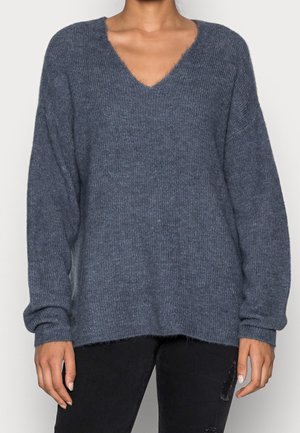 Stickad tröja - light grey