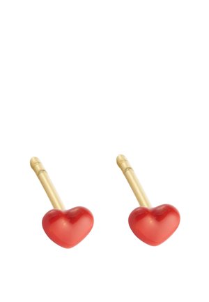 Gold-colored metal earrings with red heart-shaped plastic accents, featuring a smooth texture and a simple, curved design.