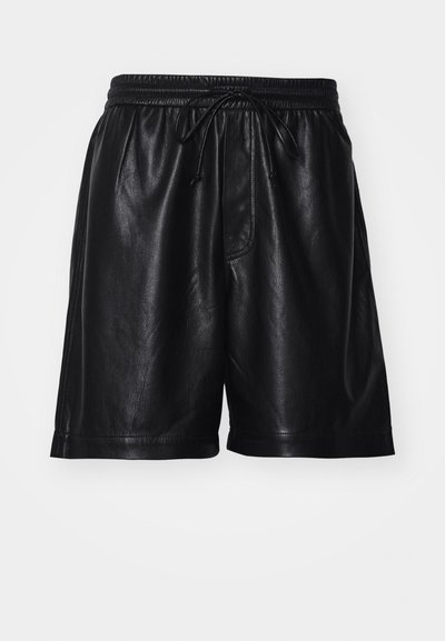 Čierne kožené šortky s elastickým pásom, šnúrkou na zaväzovanie a hladkým povrchom. Majú voľný strih a postranné vrecká.