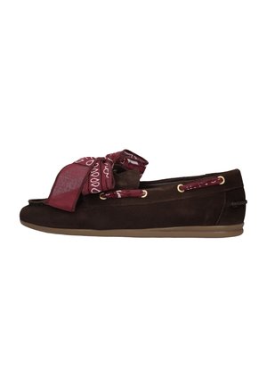 Dark brown suede moccasin-style flat shoe with light brown sole and large red patterned fabric bow on top.