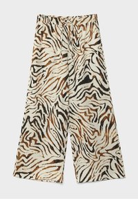 Pantalons larges avec une taille élastique, arborant une base beige et un motif audacieux de rayures de tigre abstraites en noir et marron.
