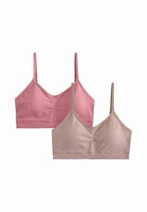 Two simple cotton bralette tops with thin straps, one in dusty pink and the other in beige, shown against a white background.