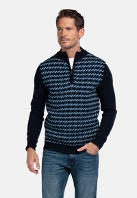 Trui met een halve rits kraag, houndstooth patroon in blauw op een marineblauwe achtergrond, gemaakt van gebreid materiaal met geribbelde manchetten en zoom.