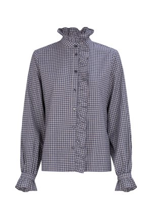 Chemise à manches longues à carreaux bleu marine et blanc, avec un col à volants, une patte de boutonnage à volants et des poignets froncés. Fermeture boutonnée à l'avant.