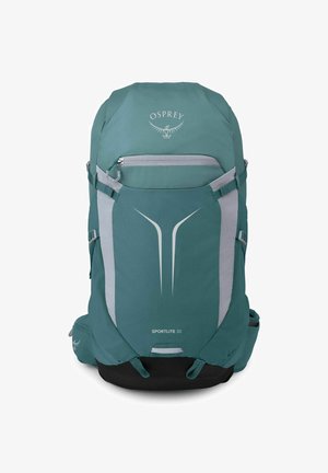 Sac à dos de randonnée Osprey Sportlite 30 bleu sarcelle et gris avec une poche avant zippée, des sangles latérales et un logo sur le dessus sur fond blanc.