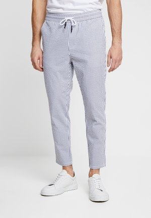 Pantalones chinos - white