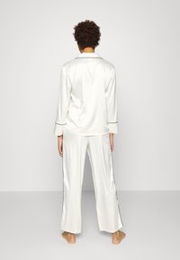 DORINA REGARDLESS - Calças de pijama - ivory