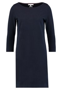 Námořnická modrá, dlouhá šaty s kulatým výstřihem. Vyrobené z hladké látky, mají rovný střih a délku ke kolenům. Jednoduchý design.