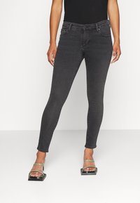 AG Jeans Vaqueros pitillo - black