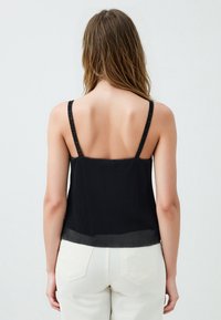 Jimmy Key Top - black
