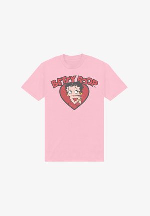 Růžové bavlněné tričko s grafikou Betty Boop uvnitř červeného srdce, s černým textem "BETTY BOOP" nad jejím obrazem.