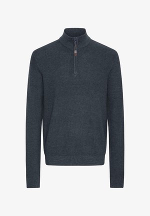 Svetr s krátkým zipem v tmavě modré barvě, pletená textura, žebrované manžety a lem, s polovičním zipem pro pohodlné nošení.
