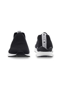 Black slip-on shoes made of textured knit material, featuring a white sole, contrasting heel cap, and a gray tab with logo at the back.