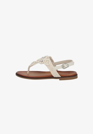 Sandali intrecciati di un beige chiaro, con un design a trecce, caratterizzati da dettagli in argento e chiusura con fibbia. Dotati di suola piatta marrone.