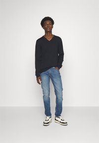 Levi's® 512™ SLIM TAPER - Džíny Slim Fit - blue denim