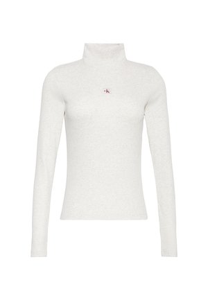Chemise à manches longues gris clair avec col roulé et petit logo "ck" rouge et noir centré sur la poitrine.