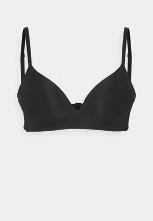 Black wireless bra with a smooth texture, V-shaped neckline, adjustable straps, and a hook closure at the back. Simple, minimal design.