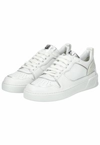 White leather sneakers with a textured sole, silver accents, perforated detailing on the toe, and a padded collar for comfort.
