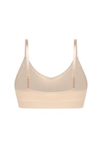 Soutien-gorge sans fil beige avec une texture lisse, des bretelles larges et un décolleté arrondi. Il présente un design sans couture et un éclat subtil. Sans rembourrage.