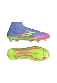 Sky blue soccer cleats with a gradient pink and green design. Features a high collar, textured surface, and a bright green outsole with studs.