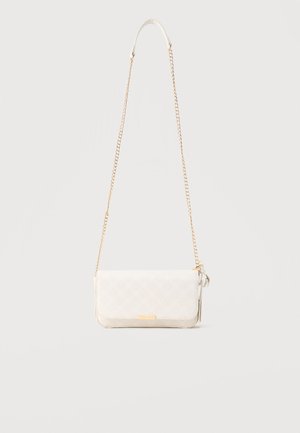 White rectangular crossbody bag with gold chain strap and small front logo plate hanging against a light background.