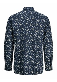 Camicia a maniche lunghe blu navy con stampa floreale piccola bianca e beige su tutta la superficie, caratterizzata da un colletto classico e polsini abbottonati.