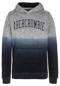 Šedá a námořnicky modrá mikina s kapucí a přechodovým designem; má kapsu typu klokánek, dlouhé rukávy a vyšívané logo na hrudi.