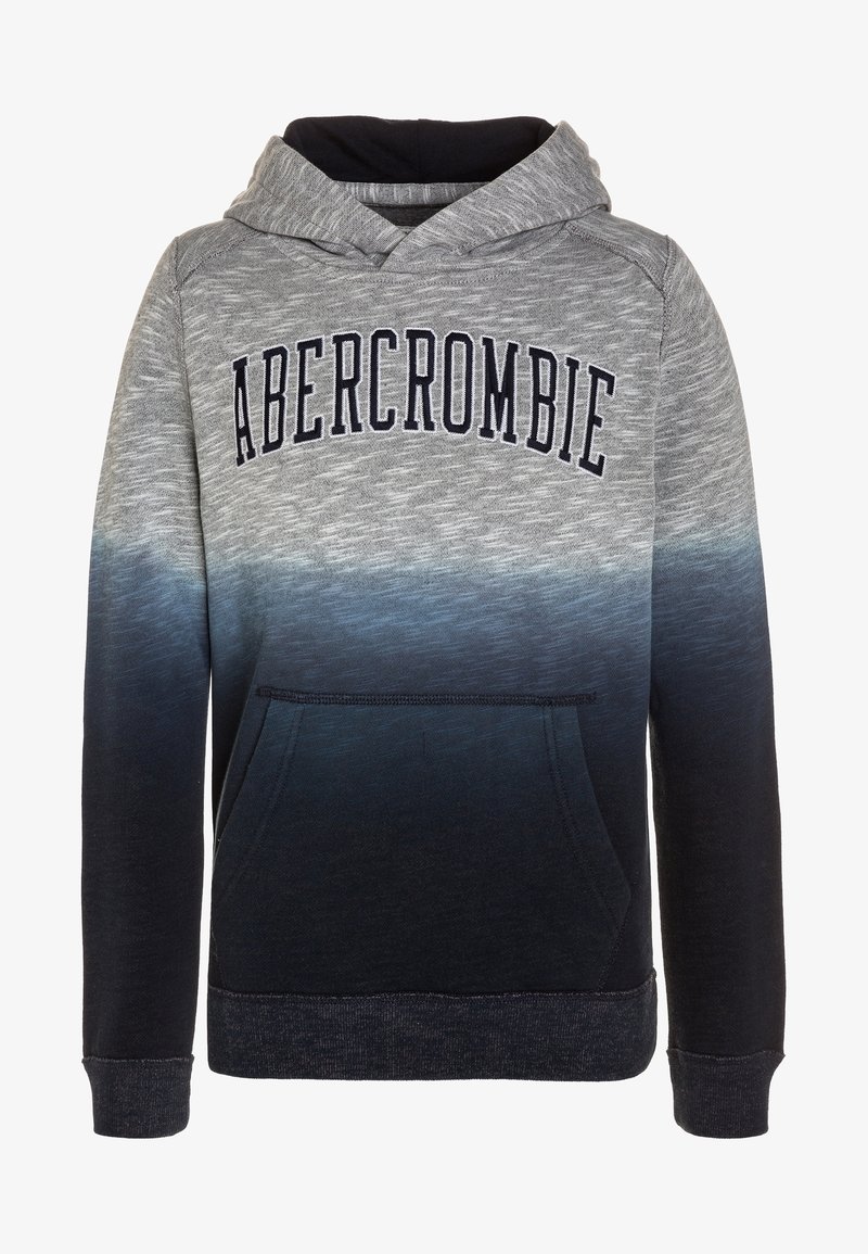 Šedá a námořnicky modrá mikina s kapucí a přechodovým designem; má kapsu typu klokánek, dlouhé rukávy a vyšívané logo na hrudi.