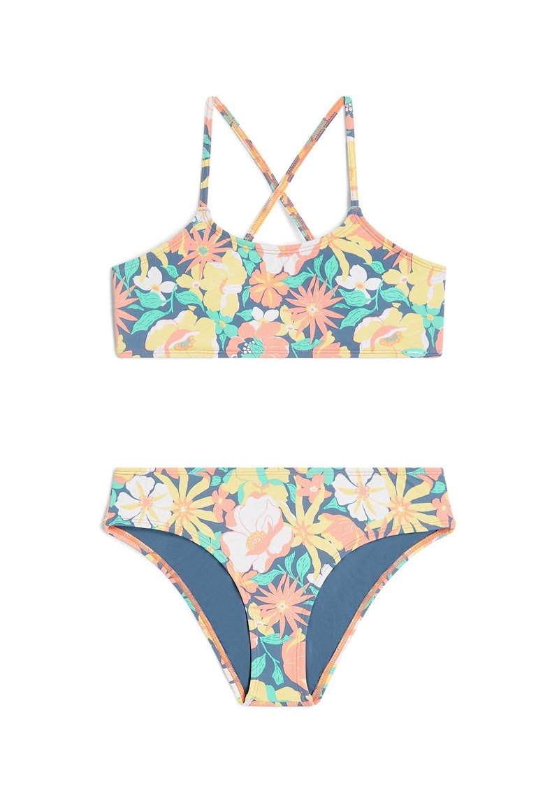 Cvetni bikini set, ki vključuje top s prečnimi naramnicami in nizkim bikinijem. Barve vključujejo breskev, rumeno, teal in zeleno.