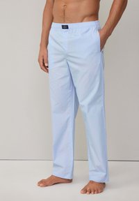 Himmelblau, leichte Hosen mit einem dezenten Streifenmuster, elastischem Bund und Seitentaschen, ideal für die Freizeit.