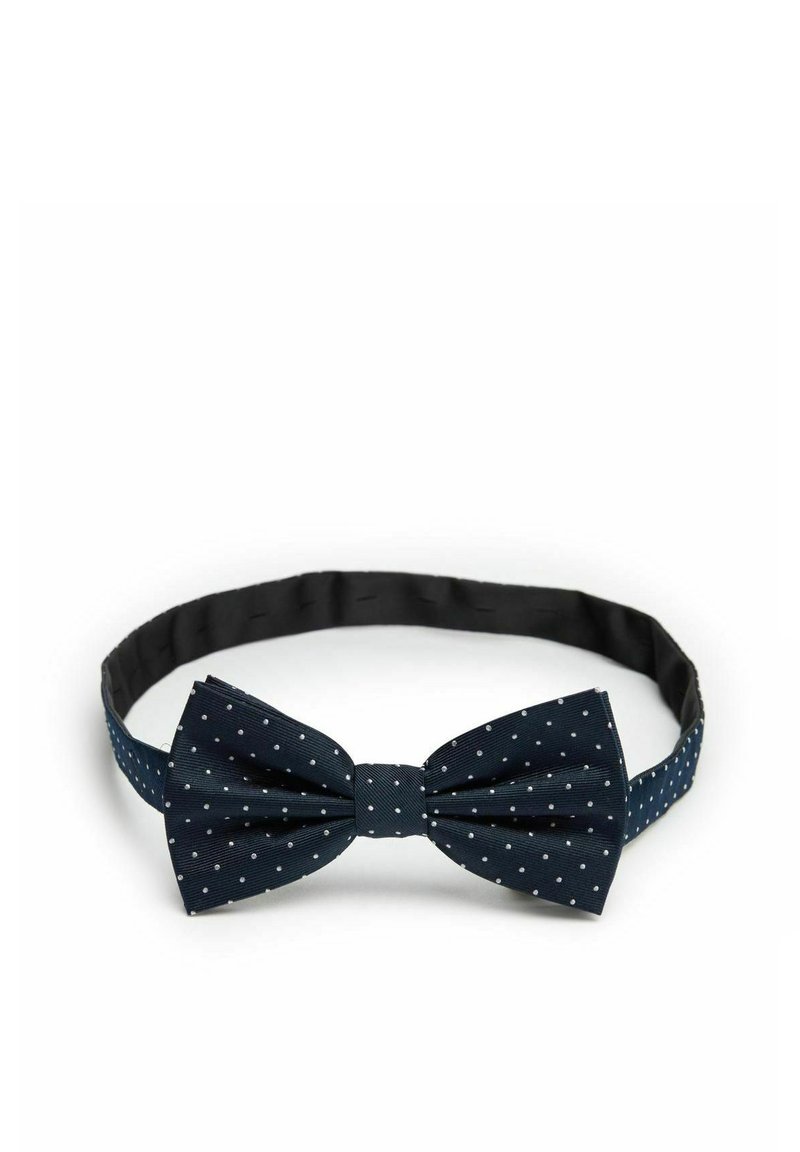 Marinfärgad fluga med vita prickar; har ett slätt tyg, band med justerbar längd och en tryckt mittdel för struktur.